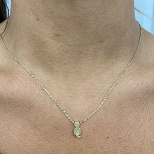 Cat shaped gold “d” necklace